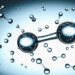 H2 hydrogen molecules on the gray background - 3d illustration